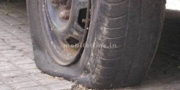 A car sped away from a pothole on the highway!