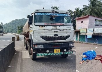 A lorry wheel that has been mounted on both legs!