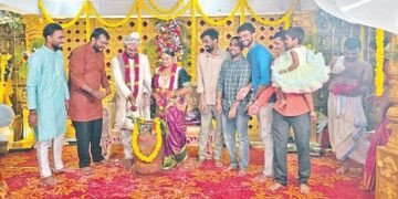 The bride and groom are wearing gas cylinders!