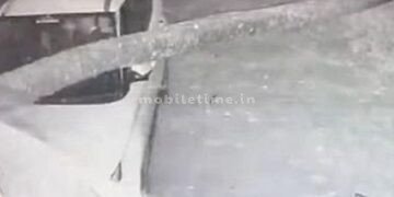 Wind and rain Tree falls on car!