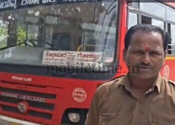 A woman exerts force on the bus!