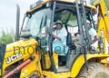 A woman is the operator of this JCB!